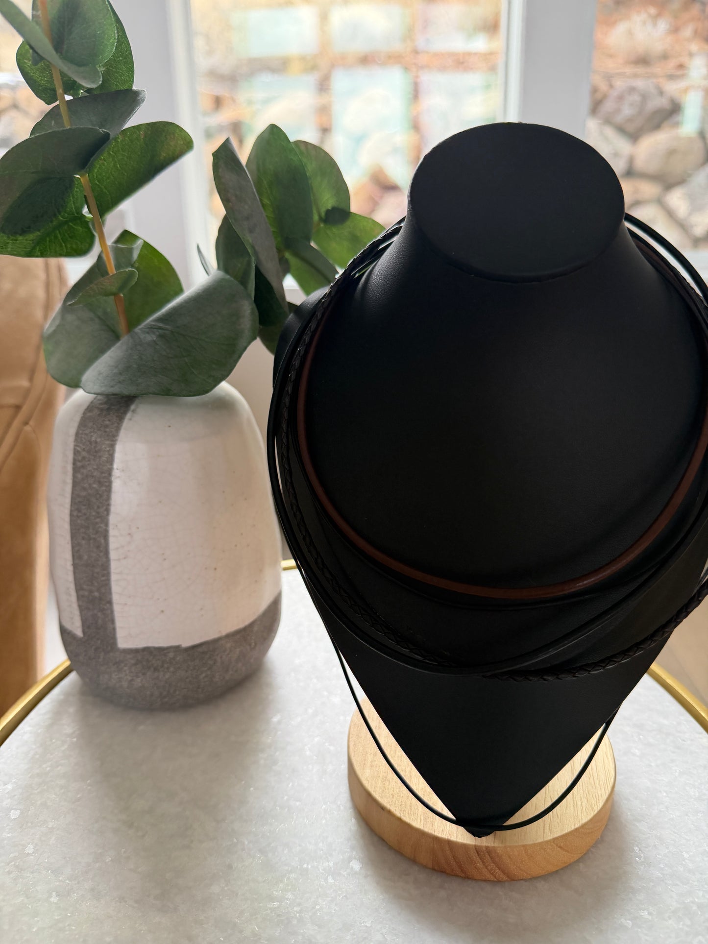 Leather cord chains with sterling silver clasps.