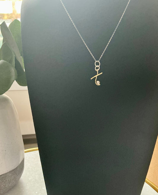 Hugs and kisses mixed metal necklace