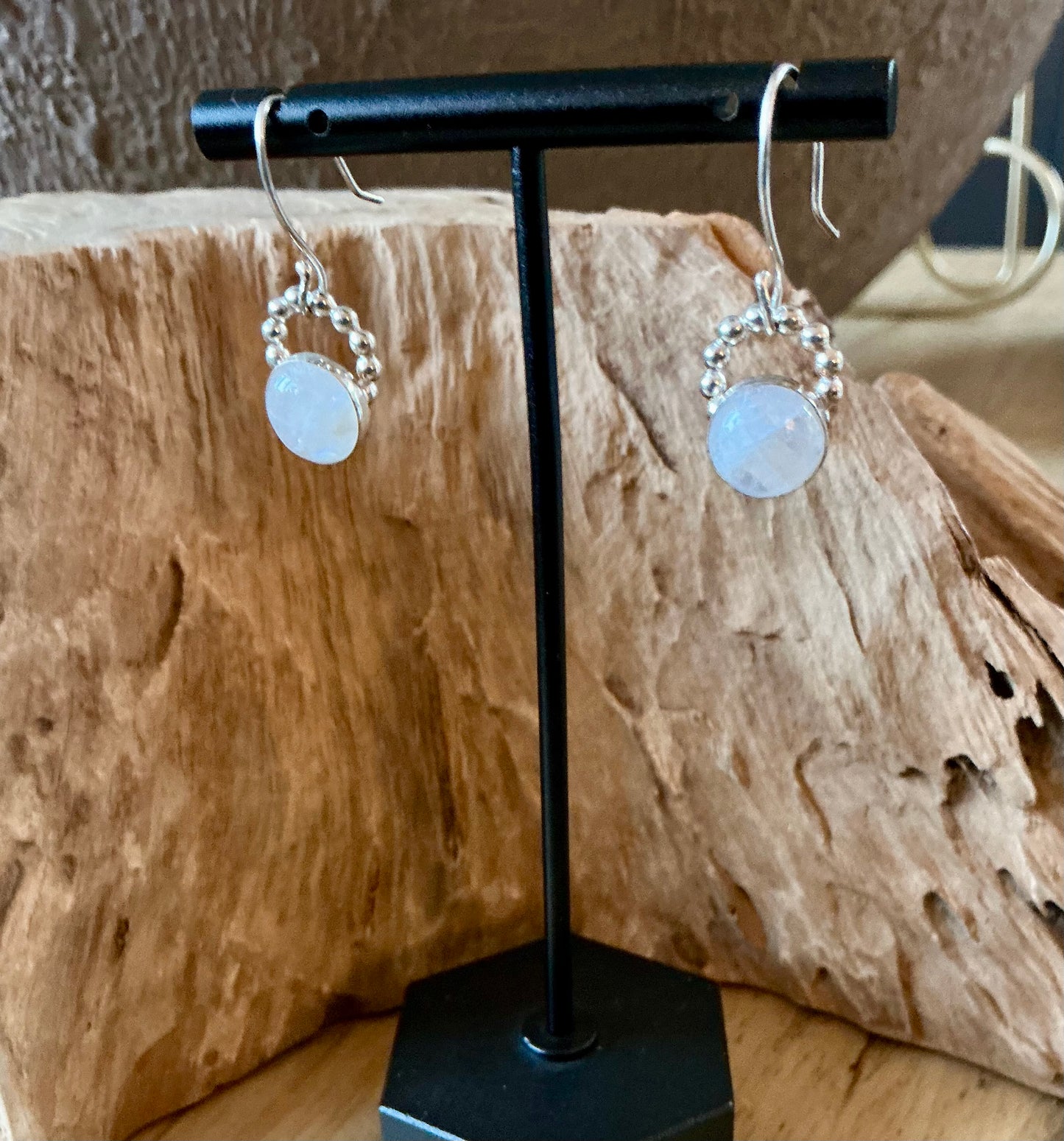 Floating moonstone earring