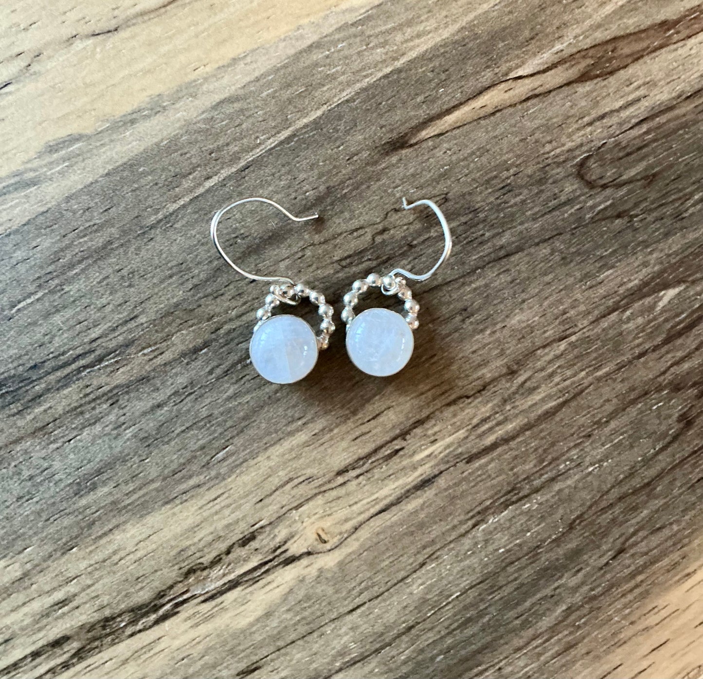 Floating moonstone earring