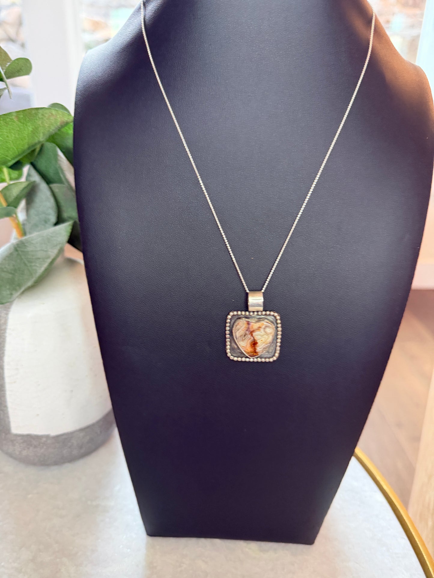 Crazy lace framed heart pendant