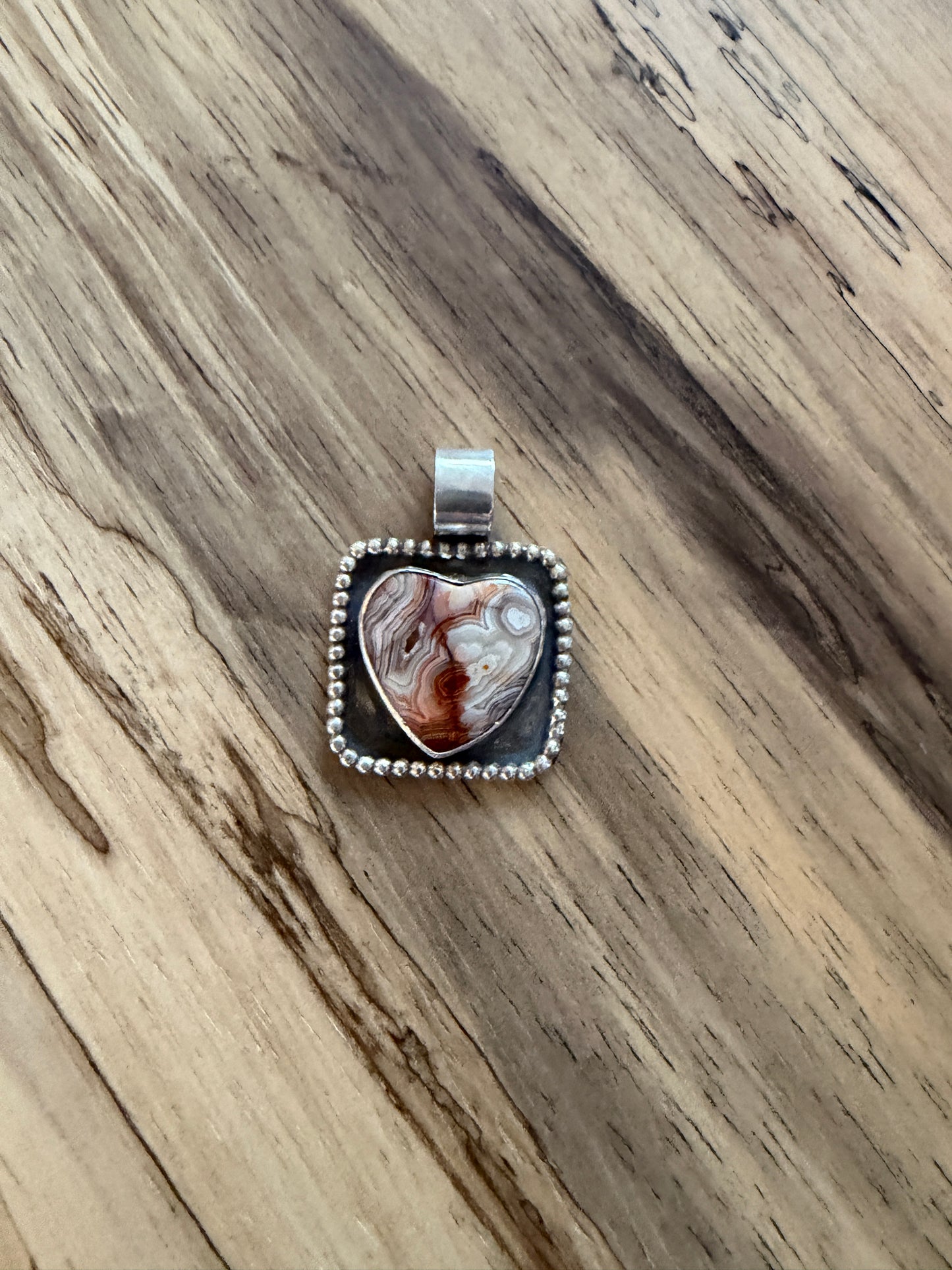 Crazy lace framed heart pendant