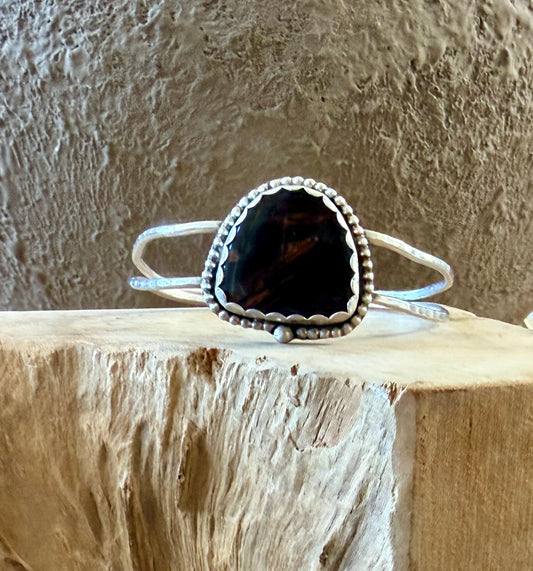 Bell obsidian cuff
